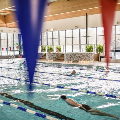 Indoor sports pool. In the background there are three jacuzzis.